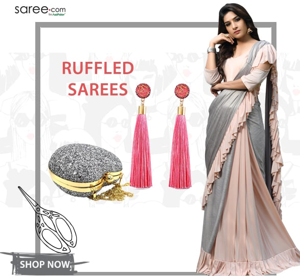 Ruffle Saree with Pink Tasseled Earrings and Silver Color Sling Bag
