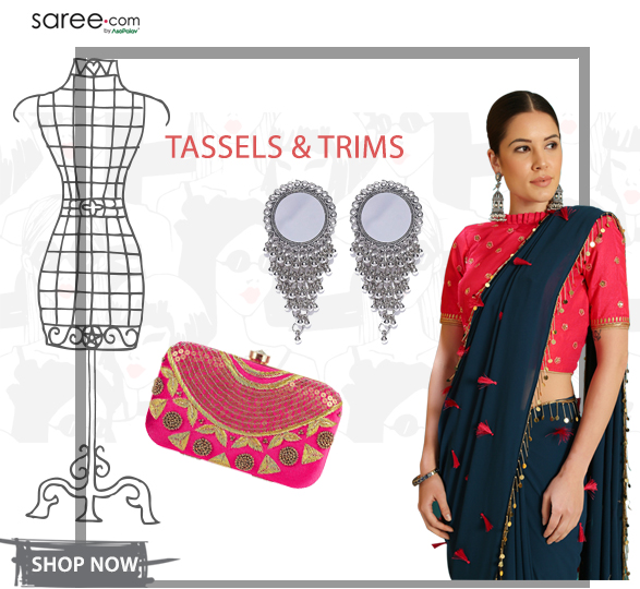Tassled Saree with Oxodised Earrings and Pink Clutch