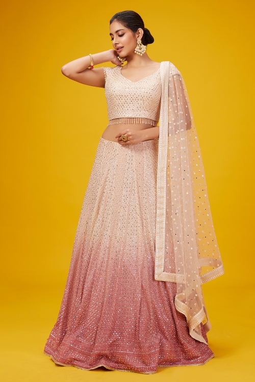 Coral Reef Peach and Cream Shaded Lehenga in Georgette Embellished with Heavy Sequins Work