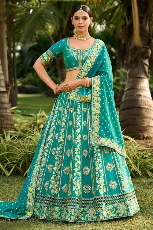 Teal Blue Banarasi Silk Peacock Motifs Lehenga with Floral Embroidery and Cutwork on Border