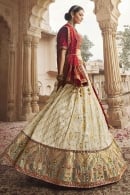 Cream Peacock Motif Woven Lehenga in Viscose with Embroidered and Sequins Border
